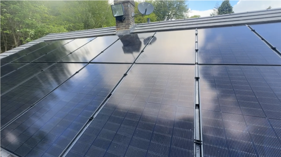 All-black solar PV array installed on a tiled roof in Tadworth, Surrey