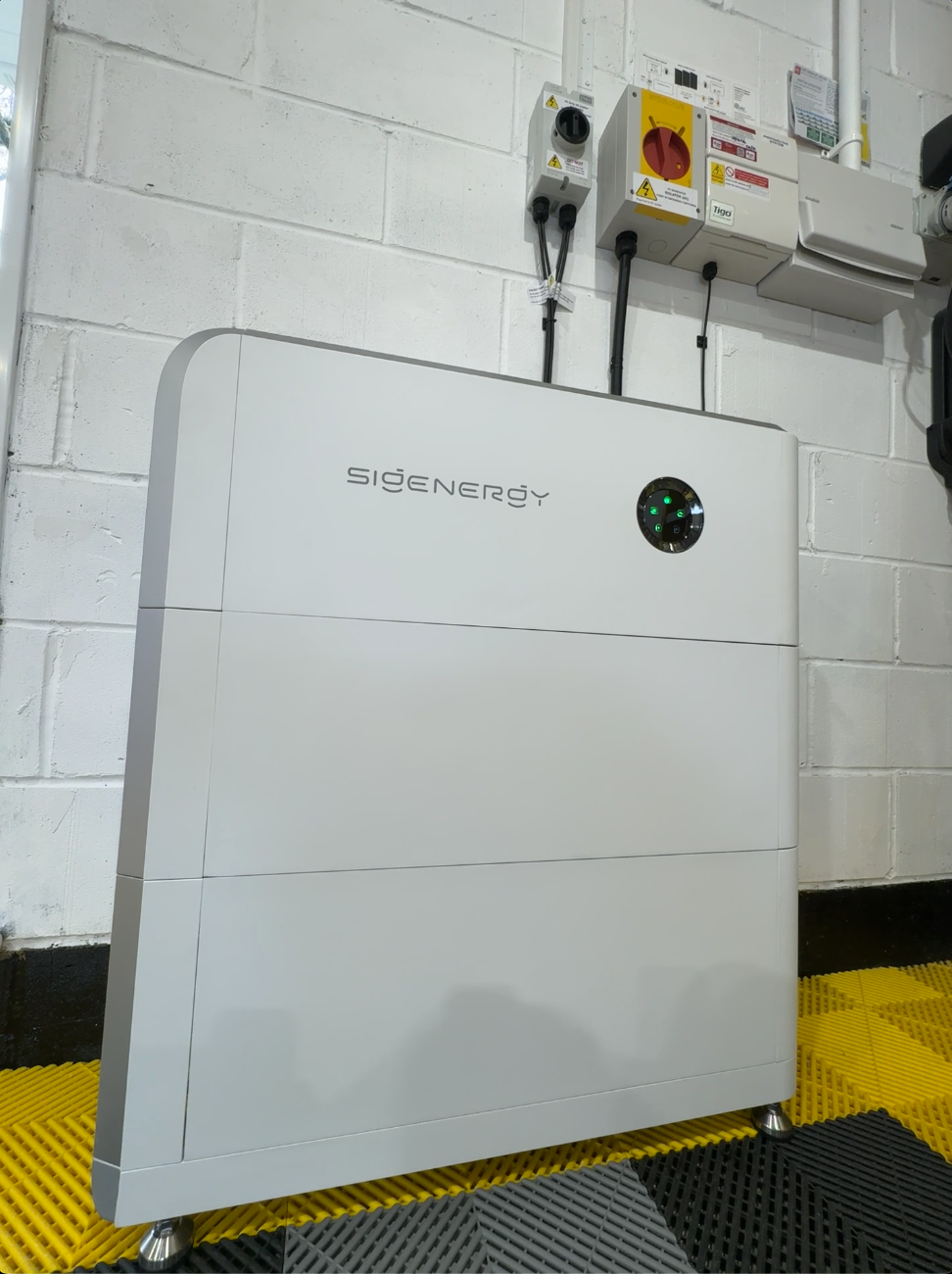 Home battery storage unit and inverter installed in a Surrey garage